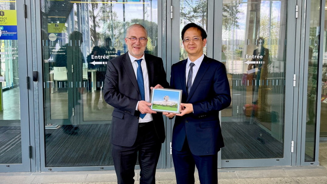 Photo rencontre Fabrice Loher et Gao Wei maire du district de Kaifu en Chine